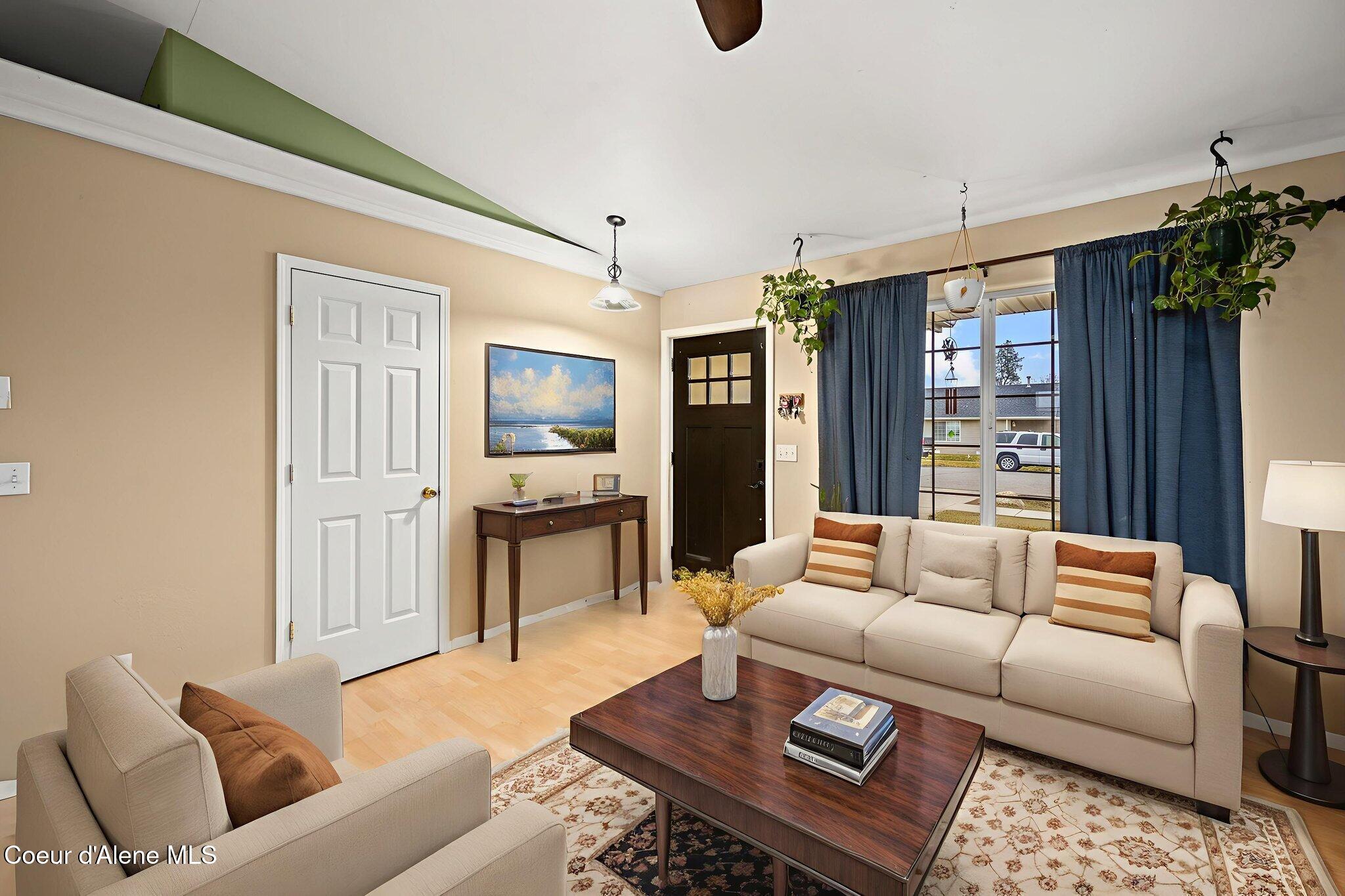 11546 North Stinson Loop Hayden, ID 83835 - Photo 8 of 29 Living room virtually staged