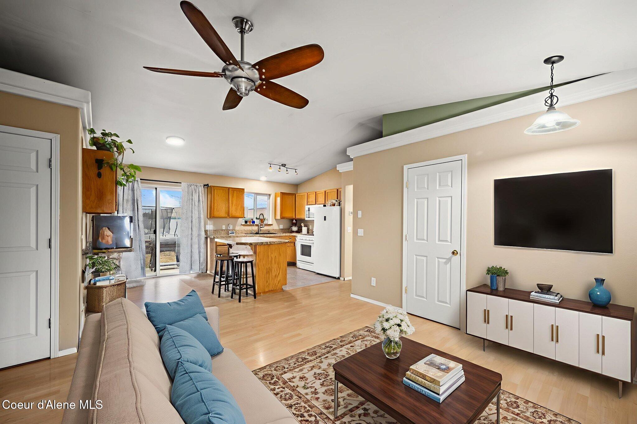 11546 North Stinson Loop Hayden, ID 83835 - Photo 10 of 29 View into kitchen virtually staged
