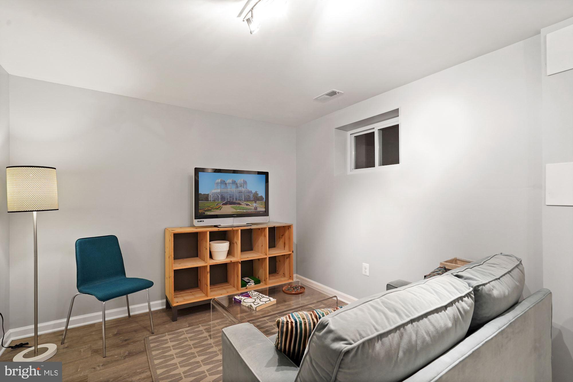 10805 Hunt Club Road Reston, VA 20190 - Photo 32 of 41 TV room - Lower level