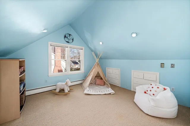 a room with toys and white walls