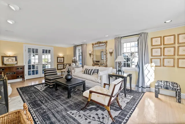 a living room with furniture and a table