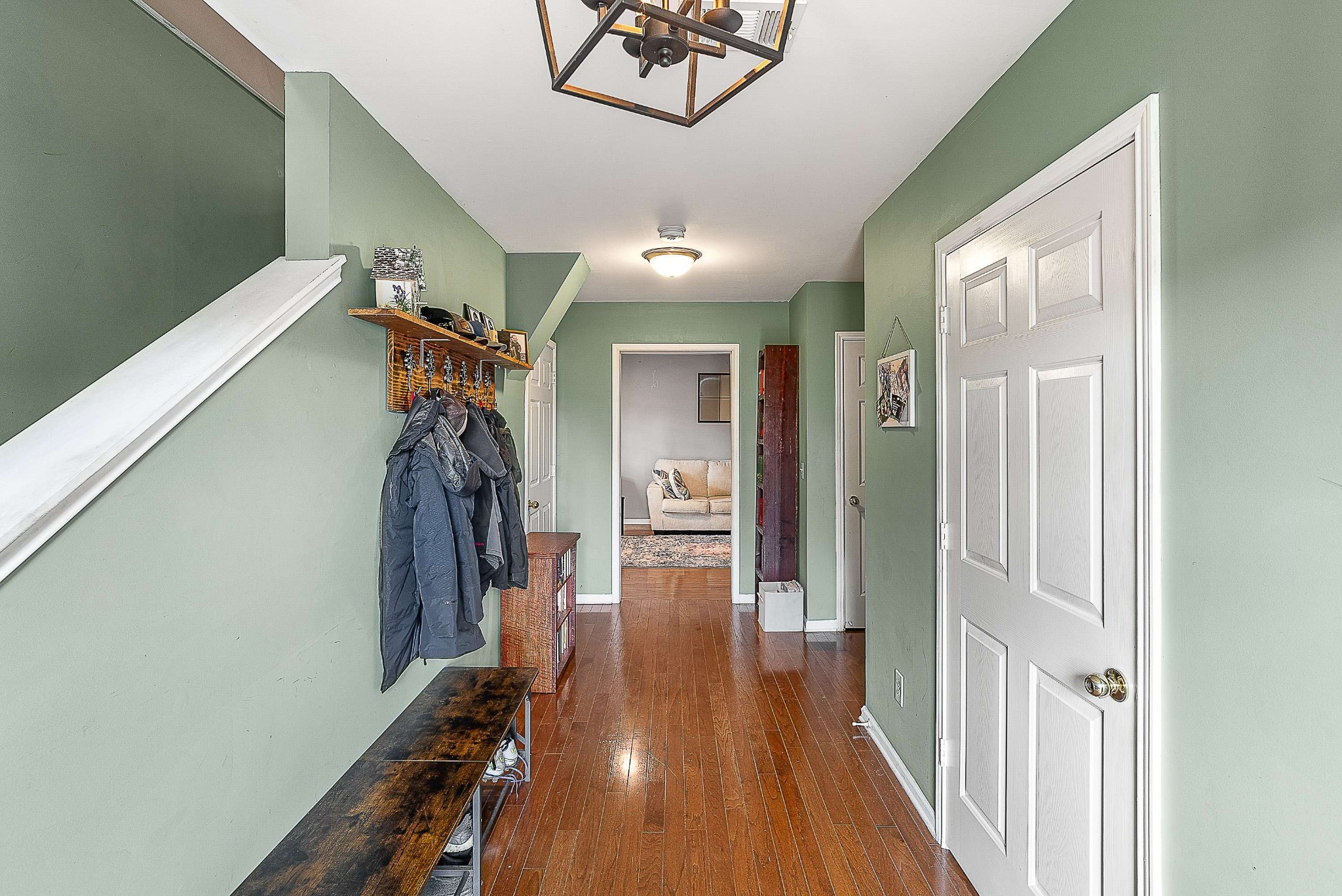 7211 Rye Court Fairview, TN 37062 - Photo 4 of 34 a view of a hallway with wooden floor and closet