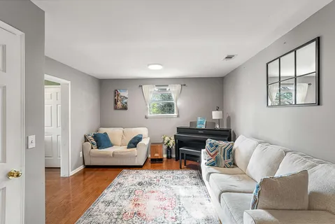 a living room with furniture and a couch
