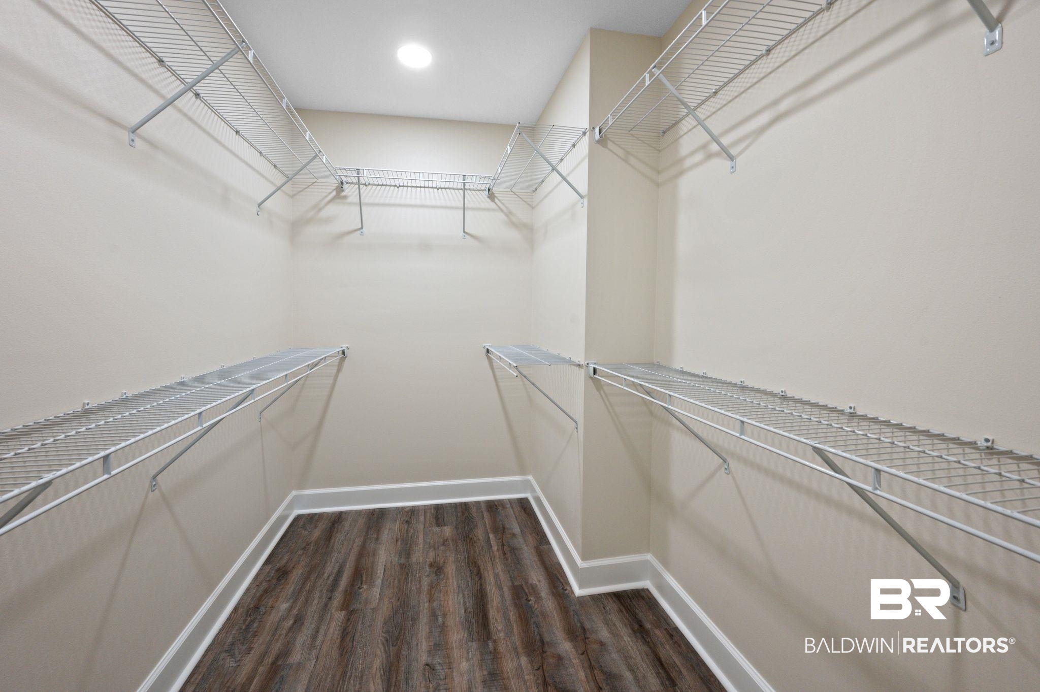 1473 Pollard Road Daphne, AL 36526 - Photo 22 of 32 Spacious closet with dark hardwood / wood-style floors