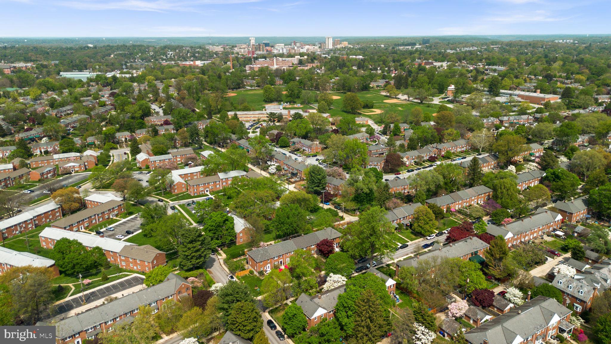 79 Murdock Road Baltimore, MD 21212 - Photo 34 of 38 Lush suburban landscape with city skyline.