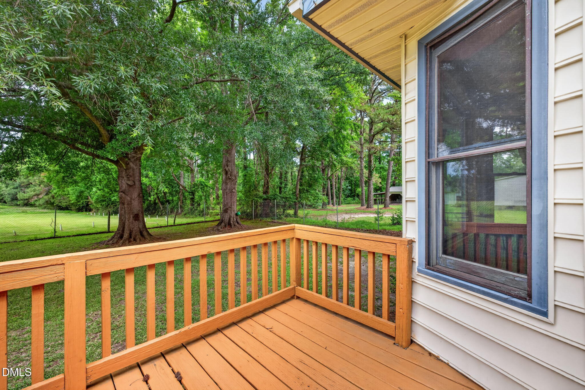 350 Grantham School Road Goldsboro, NC 27530 - Photo 26 of 49 a view of a wooden deck