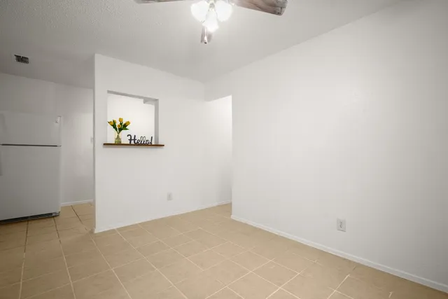 an empty room with a natural light