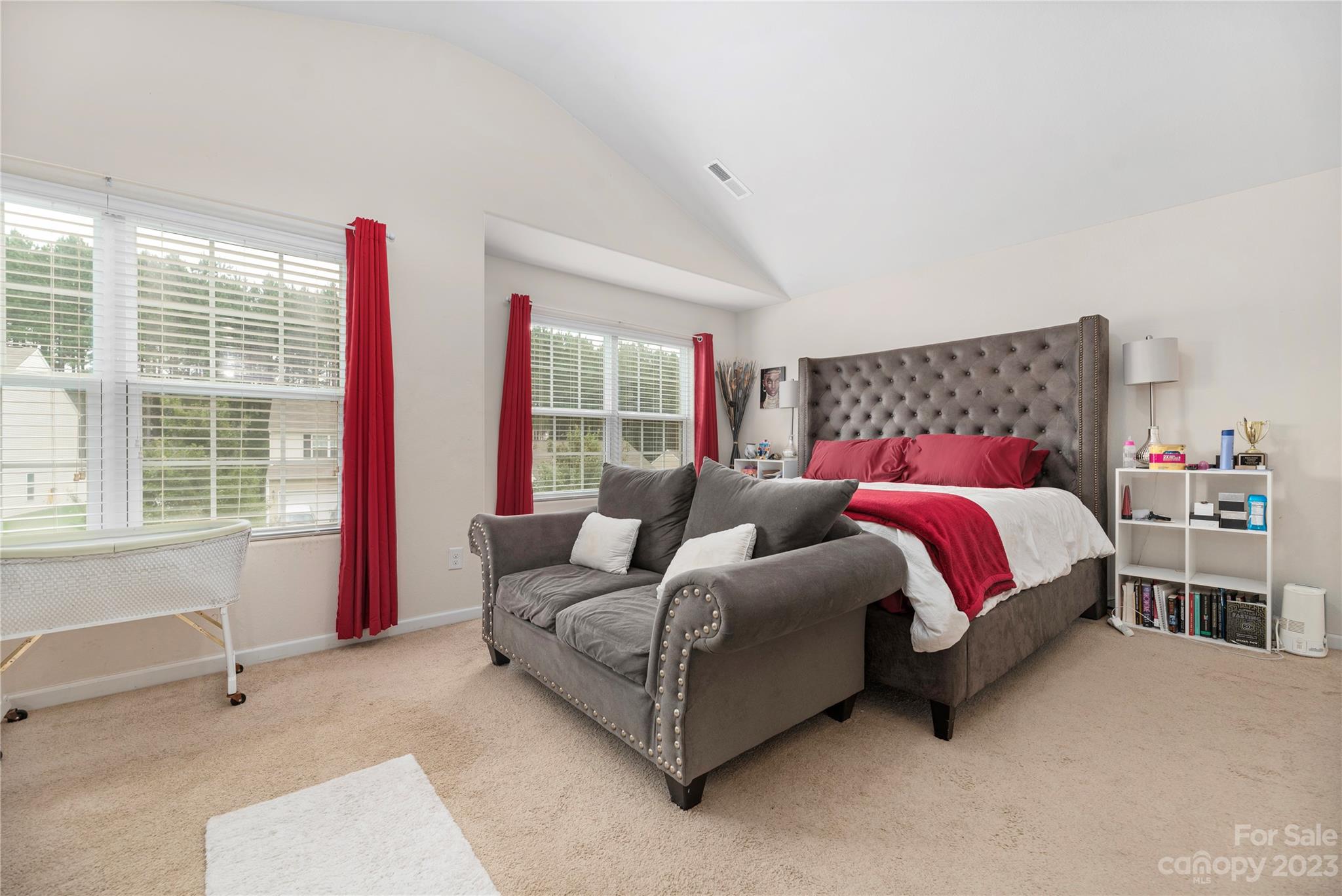 6415 Jerimoth Charlotte, NC 28215 - Photo 13 of 22 a bedroom with a bed and a couch