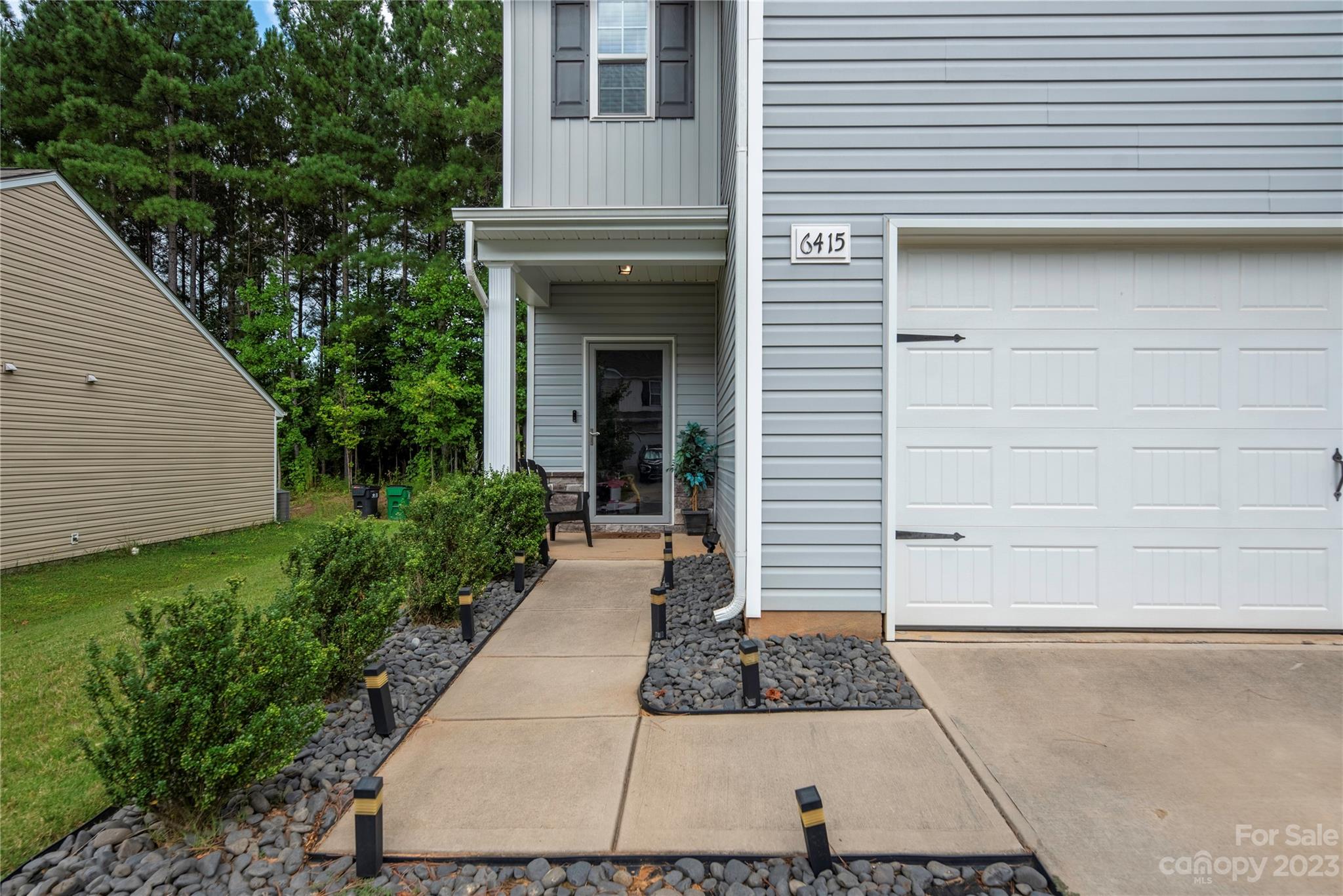 6415 Jerimoth Charlotte, NC 28215 - Photo 3 of 22 a view of a entryway door front of house