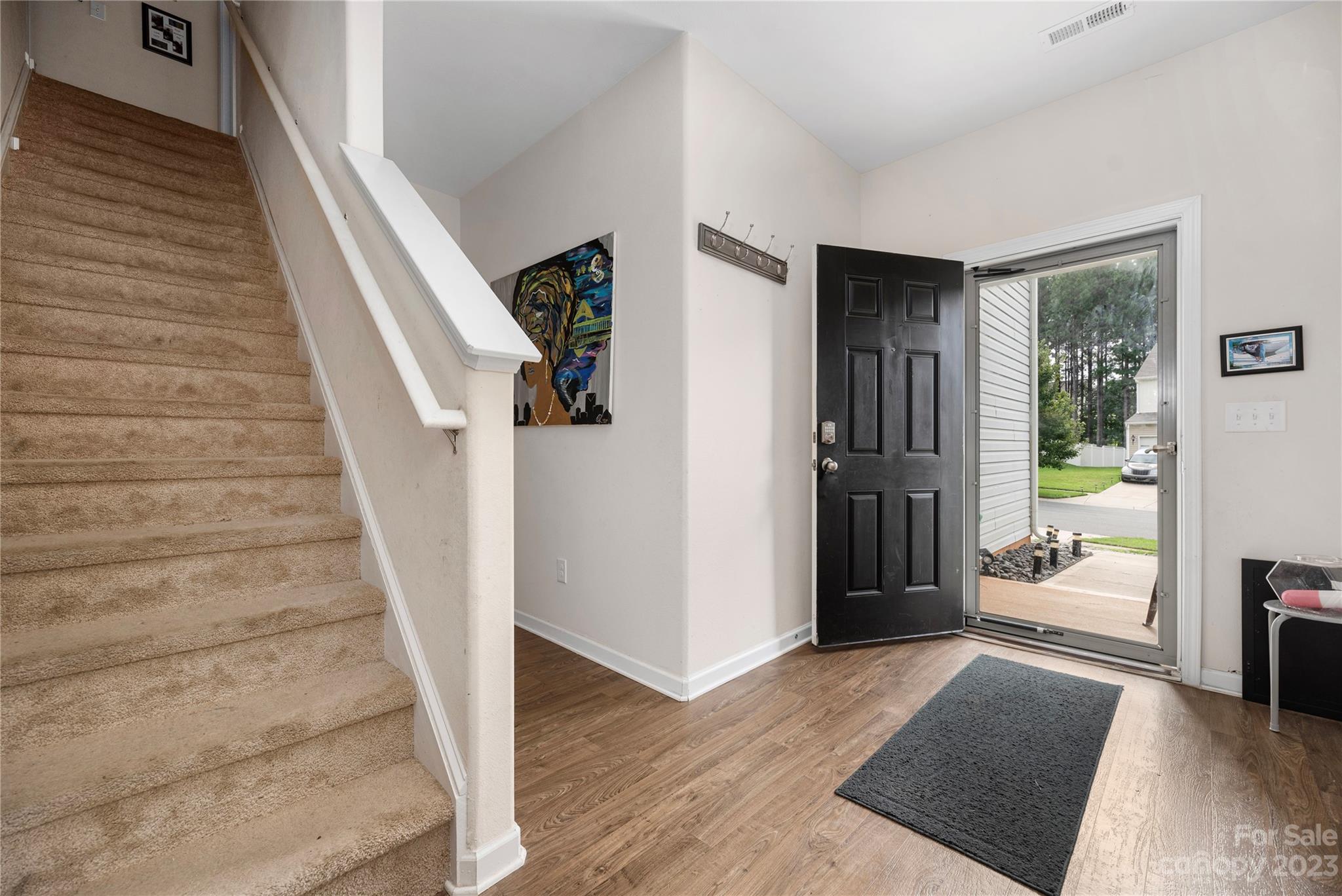 6415 Jerimoth Charlotte, NC 28215 - Photo 4 of 22 a view of entryway and hall with wooden floor