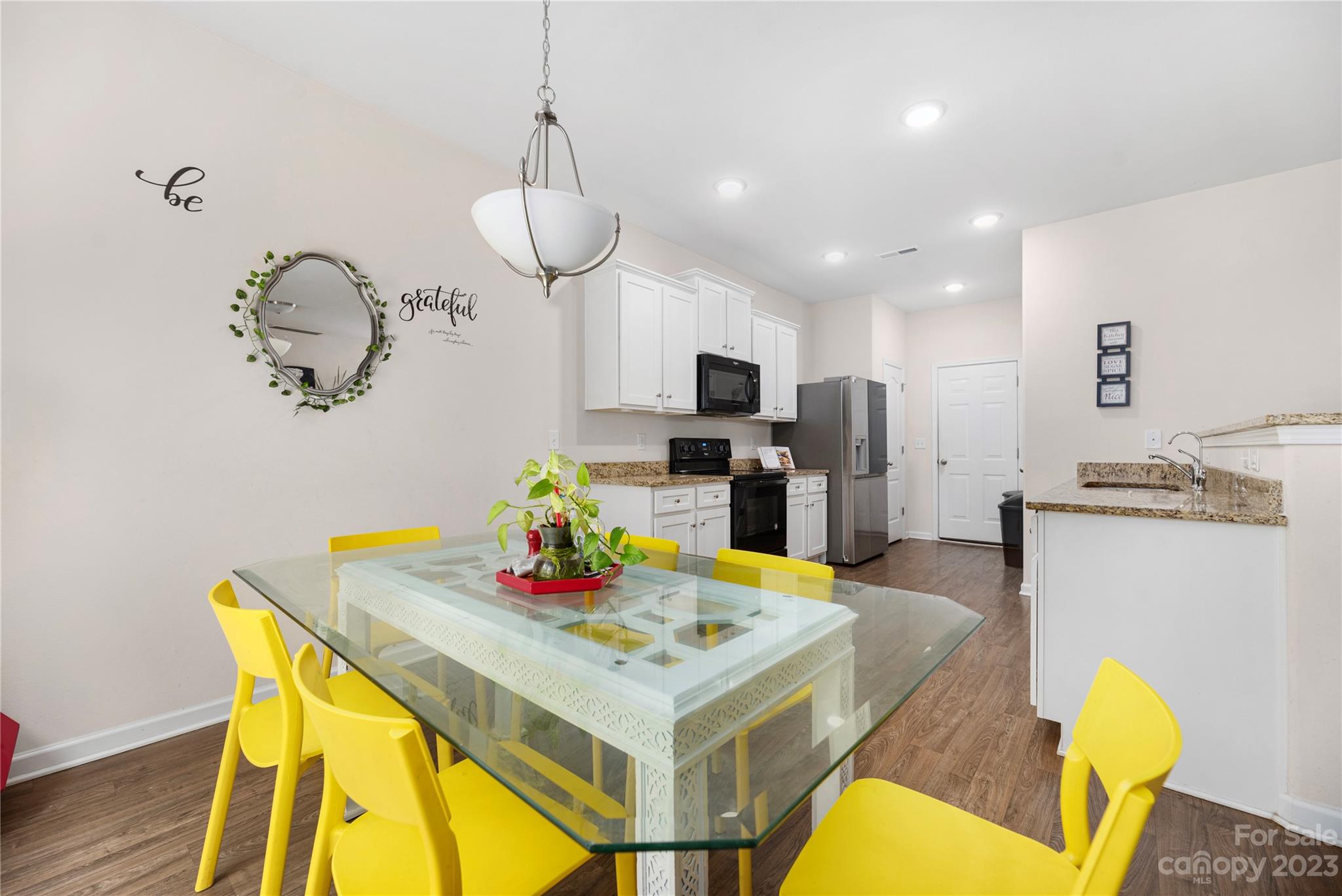 6415 Jerimoth Charlotte, NC 28215 - Photo 7 of 22 a view of a dining room with furniture and a table