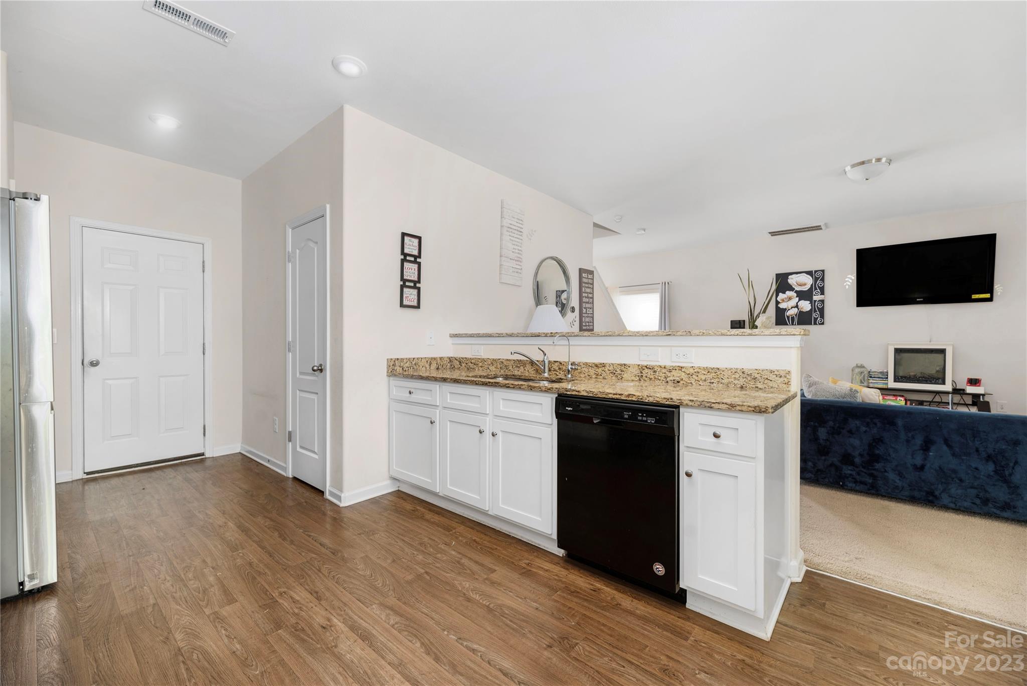 6415 Jerimoth Charlotte, NC 28215 - Photo 9 of 22 a spacious bathroom with a granite countertop sink and a mirror