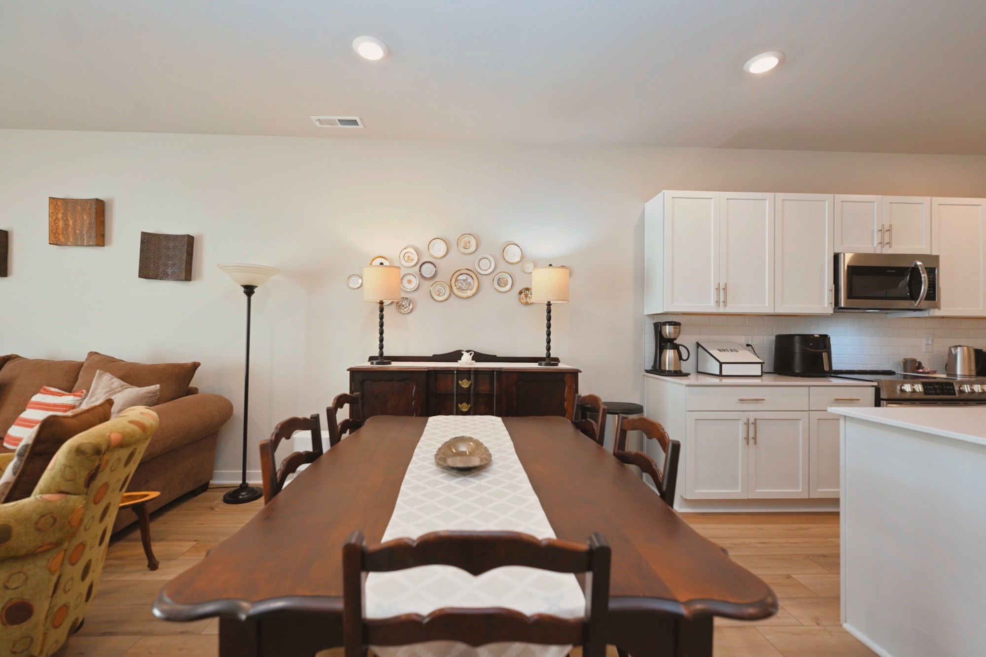 704 Mickelson Way Lebanon, TN 37087 - Photo 12 of 38 a living room with furniture a rug and white walls
