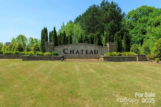 a view of a garden with swimming pool