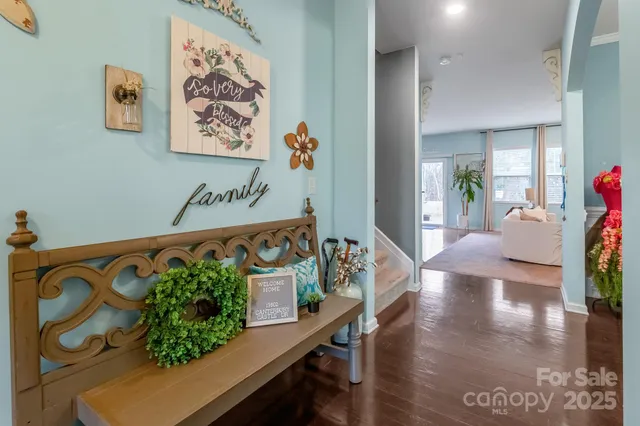 a view of a entryway door with flower pot