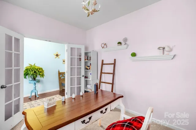 a room with furniture and chandelier