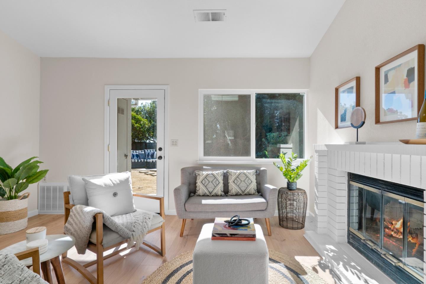 443 Sailfish Drive Aptos, CA 95003 - Photo 13 of 60 a living room with furniture and a fireplace