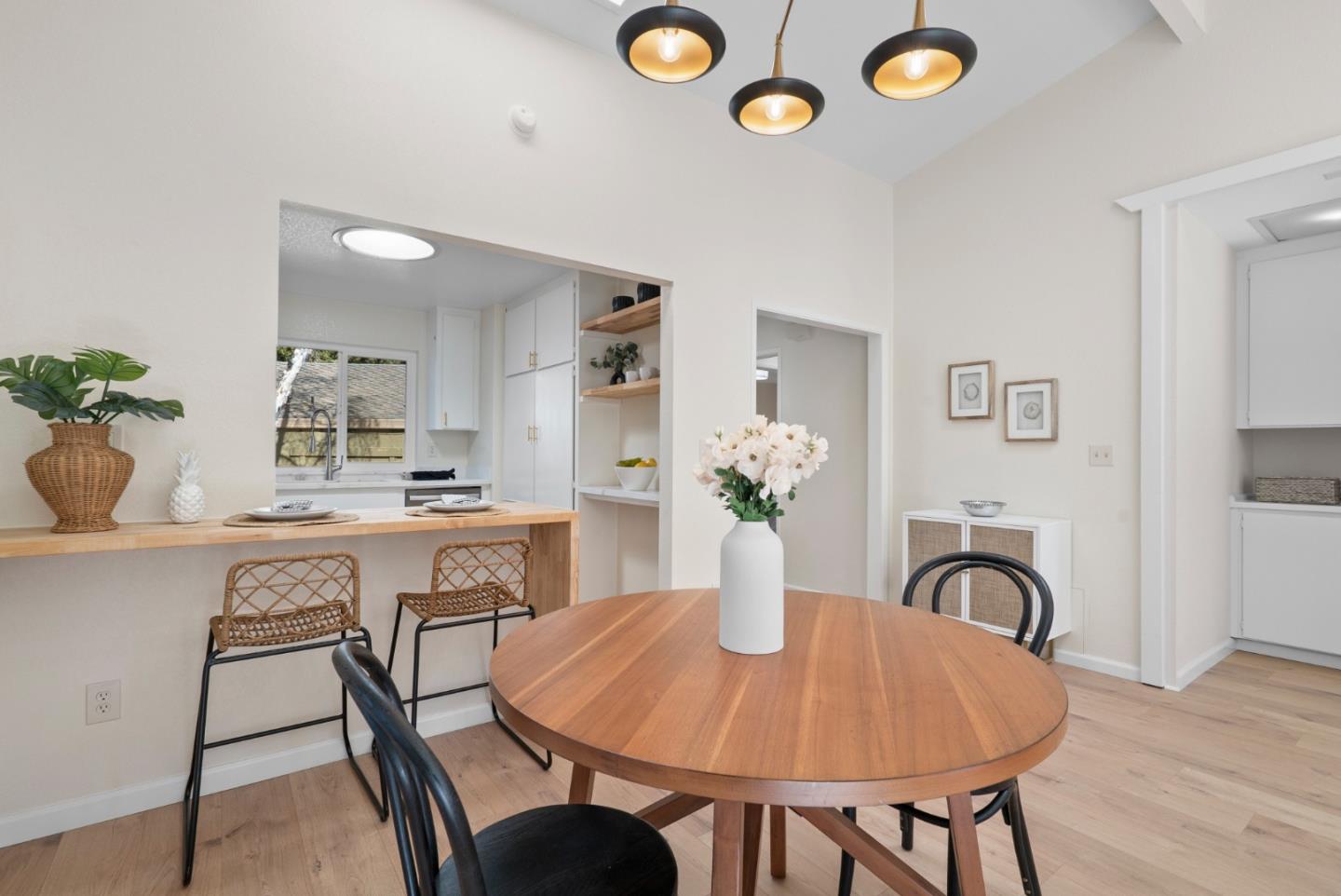 443 Sailfish Drive Aptos, CA 95003 - Photo 15 of 60 a view of a dining room with furniture and wooden floor