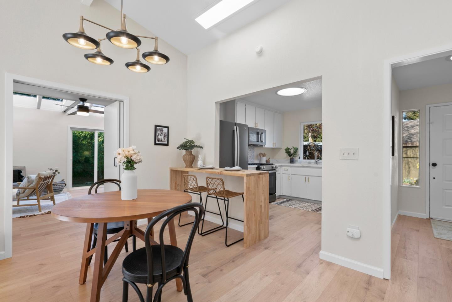 443 Sailfish Drive Aptos, CA 95003 - Photo 16 of 60 a view of a dining room with furniture and a chandelier