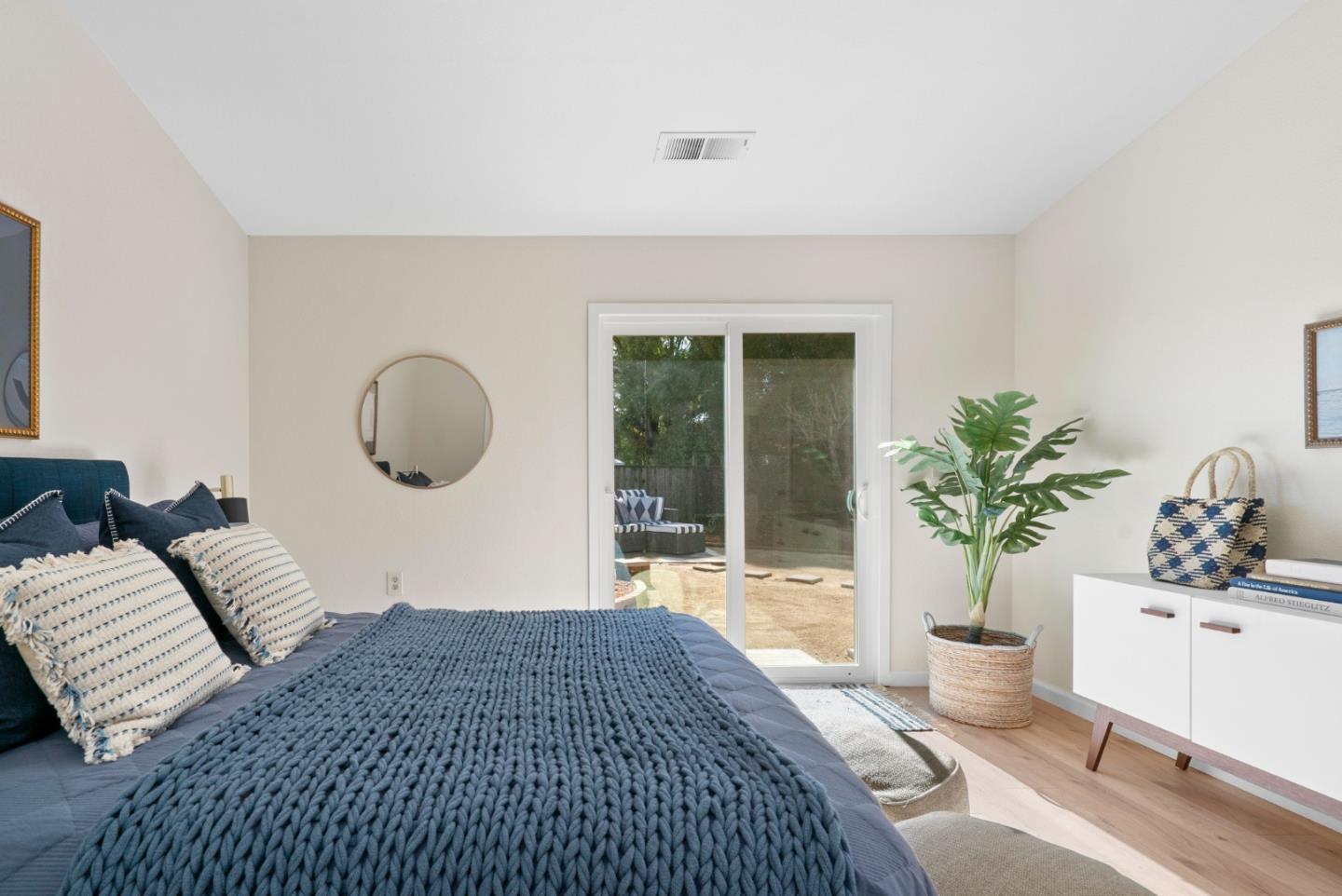 443 Sailfish Drive Aptos, CA 95003 - Photo 24 of 60 a bedroom with bed and wooden floor