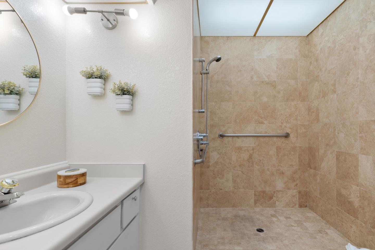 443 Sailfish Drive Aptos, CA 95003 - Photo 25 of 60 a bathroom with a shower and a sink