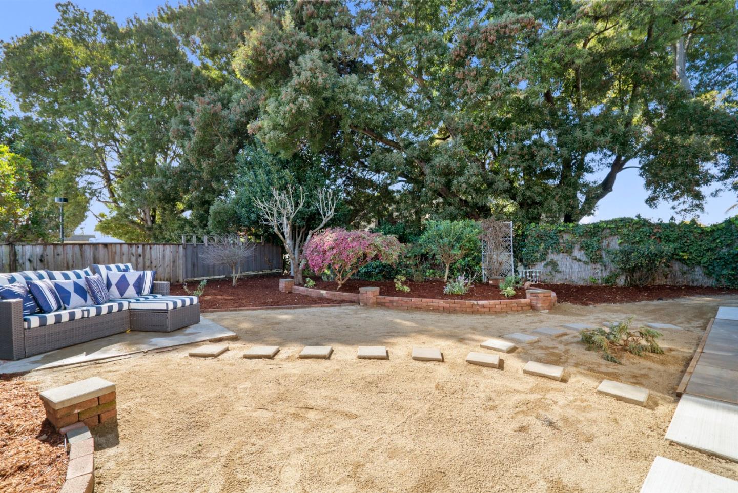 443 Sailfish Drive Aptos, CA 95003 - Photo 44 of 60 a view of a backyard with a tree