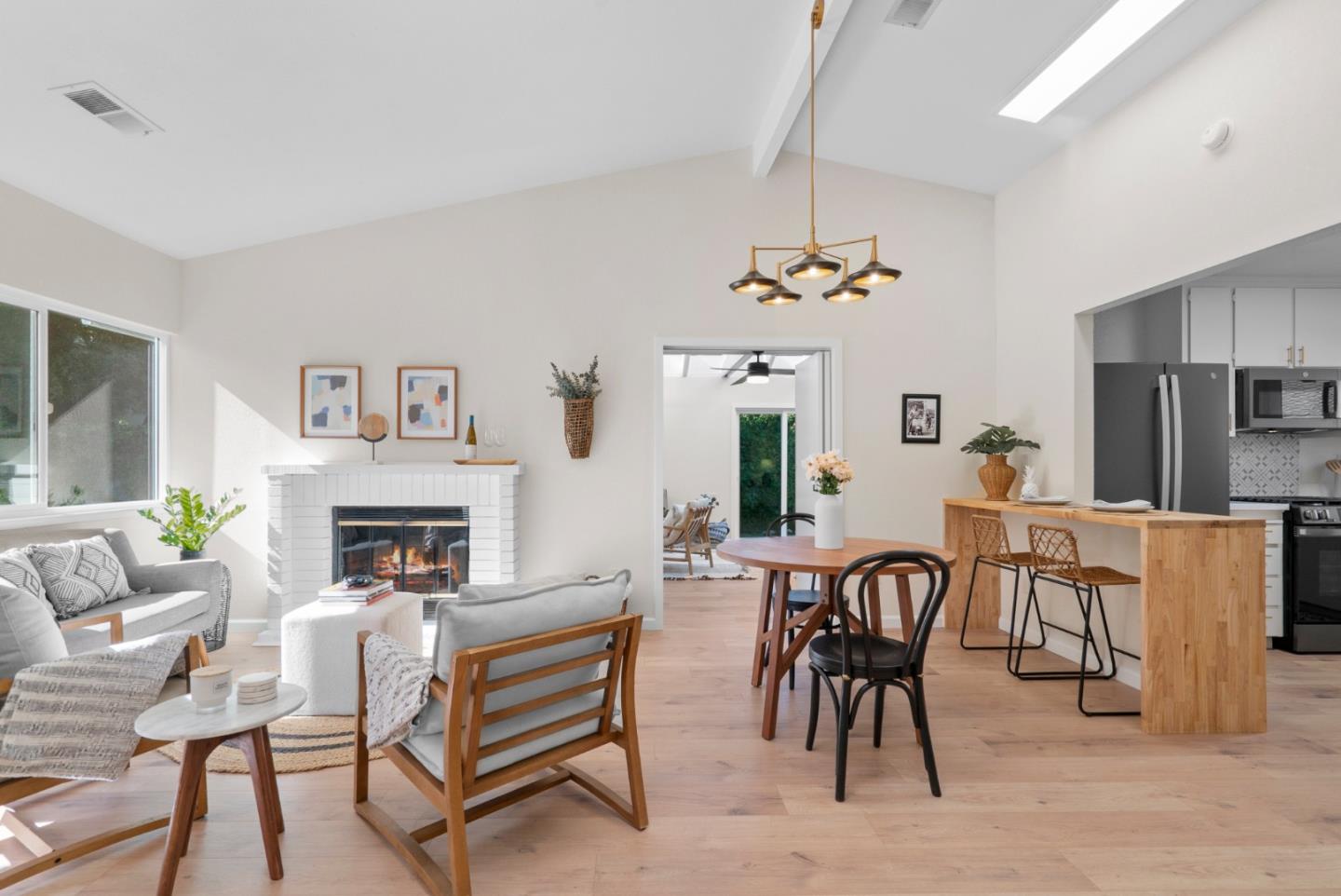 443 Sailfish Drive Aptos, CA 95003 - Photo 10 of 60 a living room with furniture a fireplace and a table