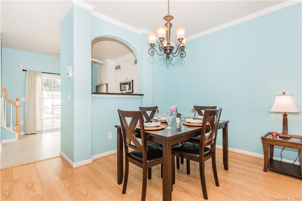 752 Shellstone Place Fort Mill, SC 29708 - Photo 8 of 23 a view of a dining room with furniture and chandelier