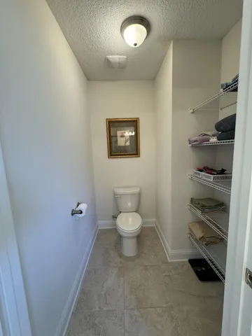 a bathroom with a toilet