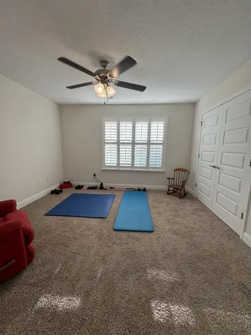 a room with toys and a chandelier