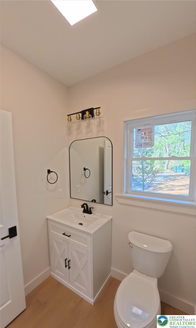 41 South 2nd Street Emmaus, PA 18049 - Photo 16 of 37 a bathroom with a toilet sink and mirror