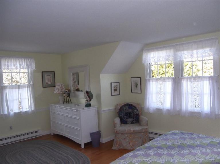 30 Twiss Road Orleans, MA 02653 - Photo 23 of 29 a living room with furniture and a window