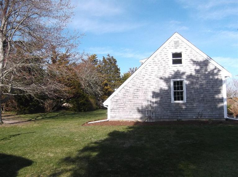 30 Twiss Road Orleans, MA 02653 - Photo 8 of 29 a view of a backyard of the house