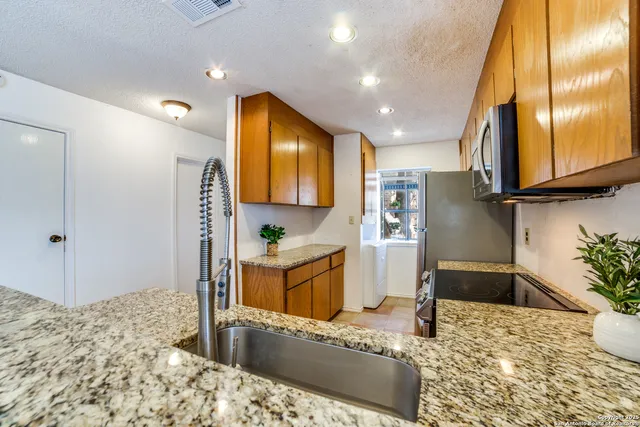 $179,900 | 11815 Vance Jackson Road, Unit E501, San Antonio, TX 78230