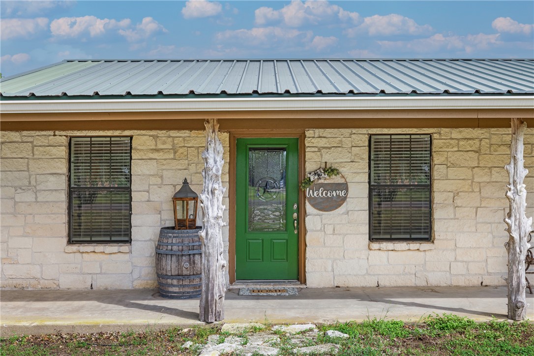 3540 Fisher Ranch Road Bryan, TX 77808 - Photo 4 of 36 a front view of a house with garden