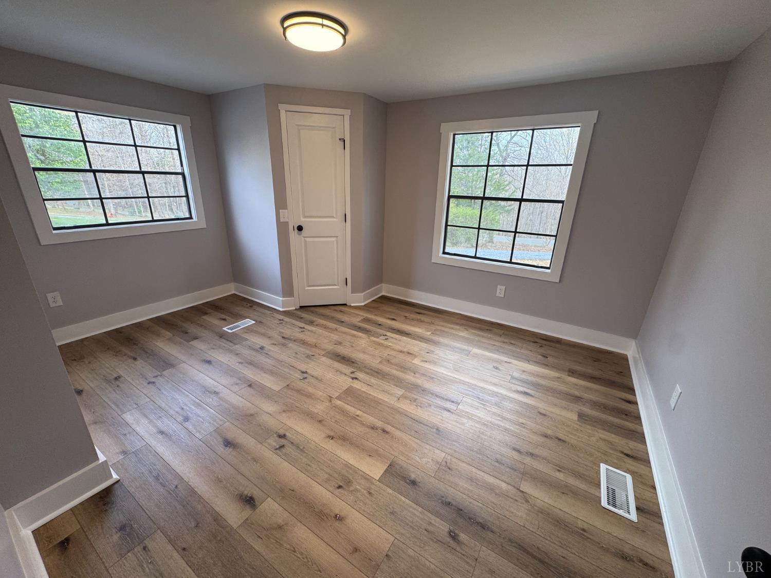 137 Ridgeview Lane Madison Heights, VA 24572 - Photo 20 of 22 an empty room with windows