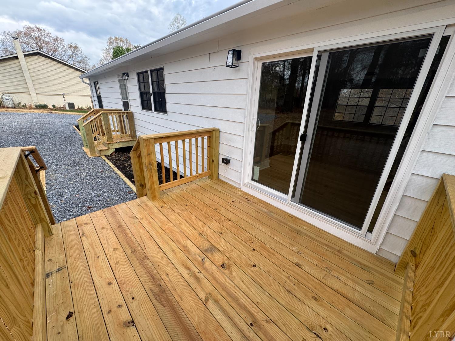 137 Ridgeview Lane Madison Heights, VA 24572 - Photo 22 of 22 a view of backyard with a deck and wooden floor