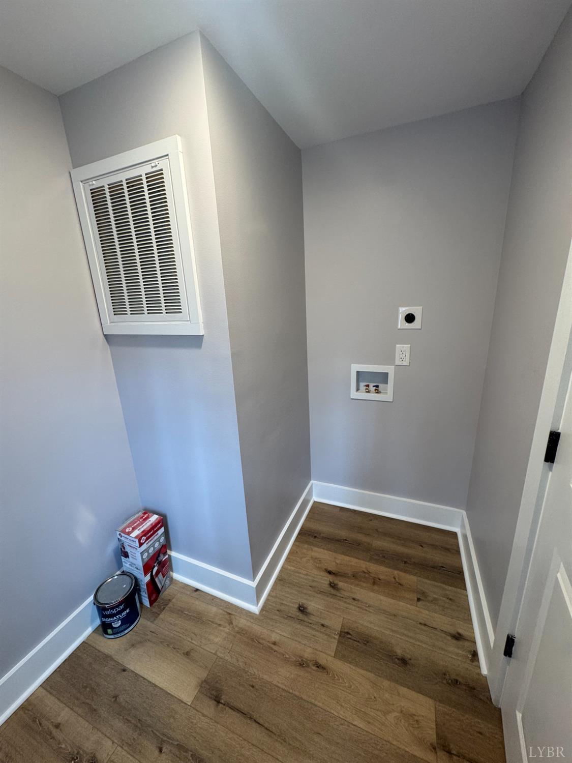 137 Ridgeview Lane Madison Heights, VA 24572 - Photo 7 of 22 an empty room with wooden floor chandelier and windows