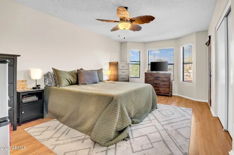 a view of a dining room with furniture and window
