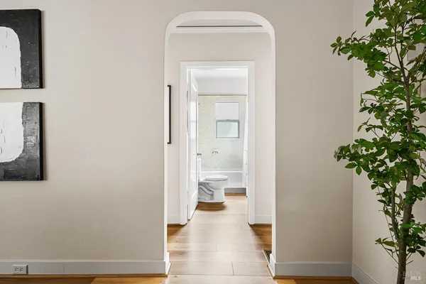 a bed room with a bed and a window