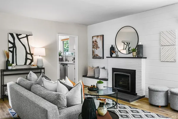 a kitchen with stainless steel appliances a refrigerator sink and cabinets