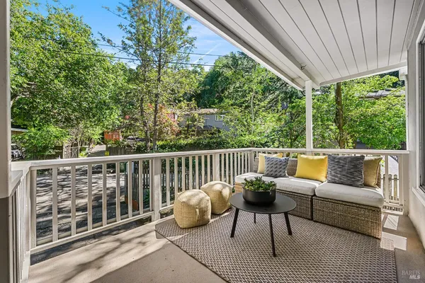 a living room with furniture or couch and a fireplace