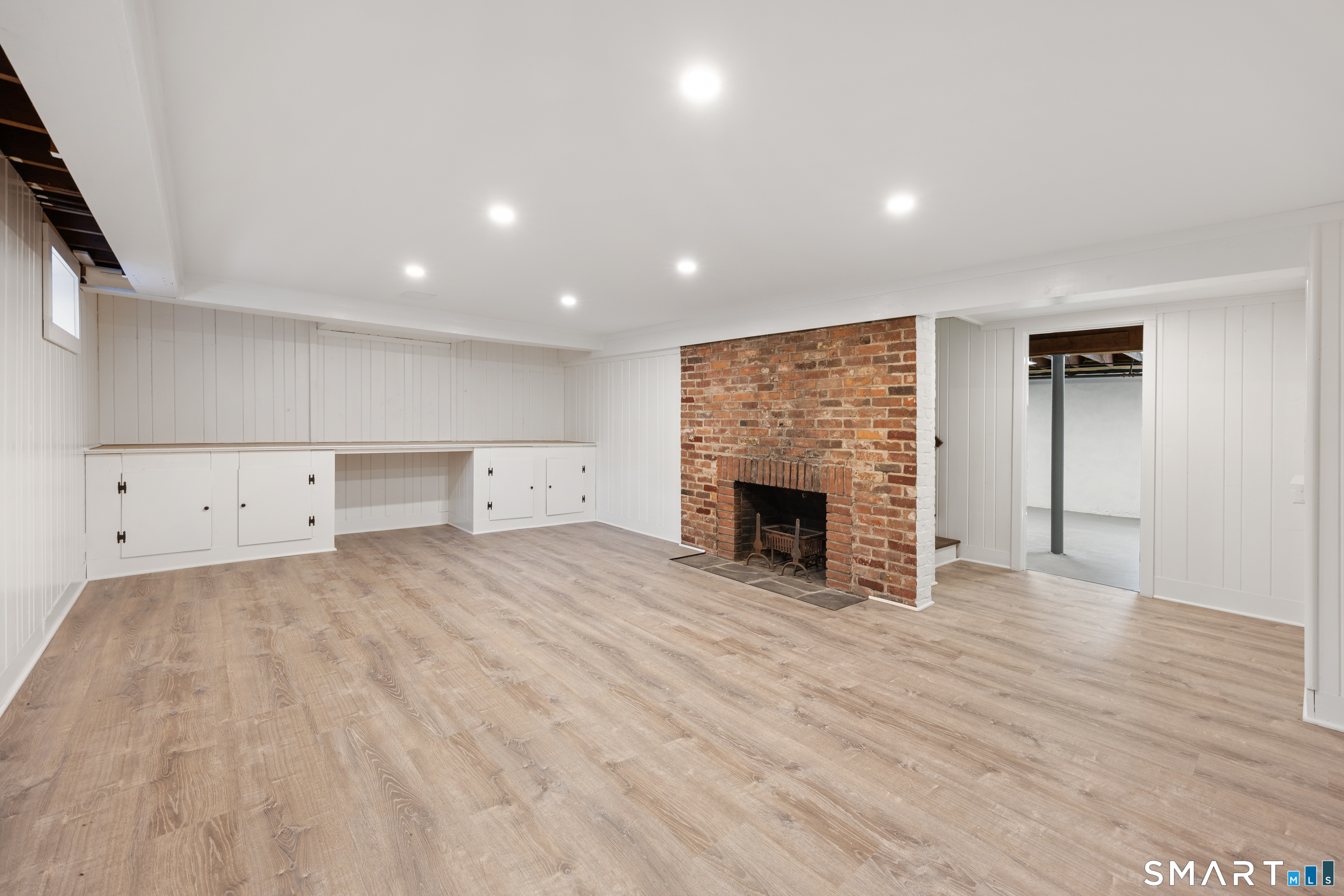 768 North Brooksvale Road Cheshire, CT 06410 - Photo 30 of 39 Finished area of basement with fireplace