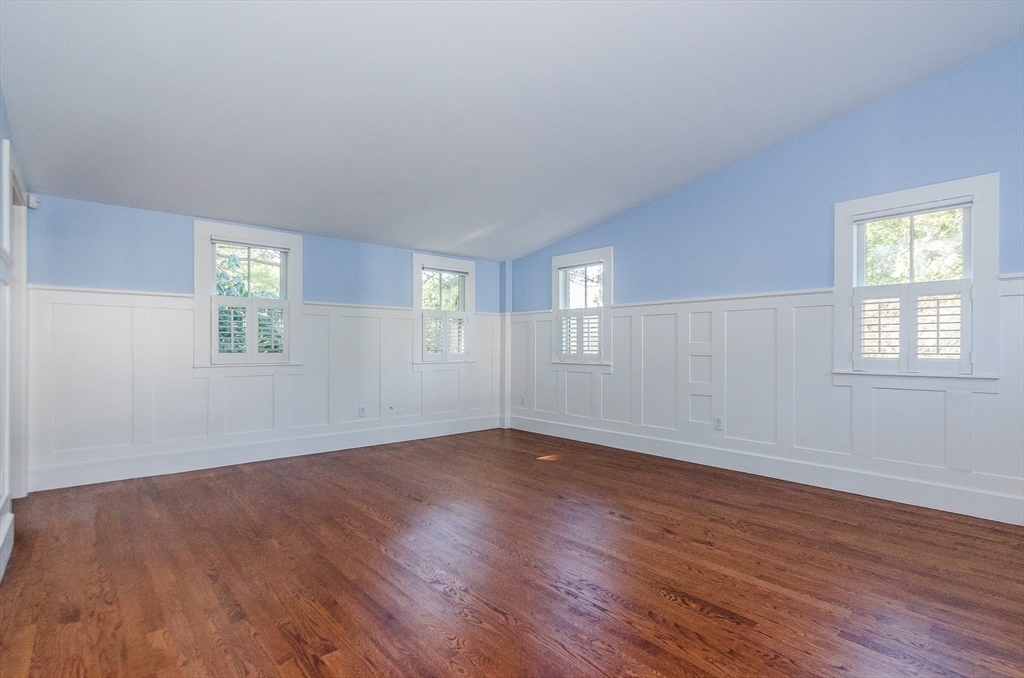 345 Point Road Marion, MA 02738 - Photo 21 of 41 an empty room with wooden floor and windows