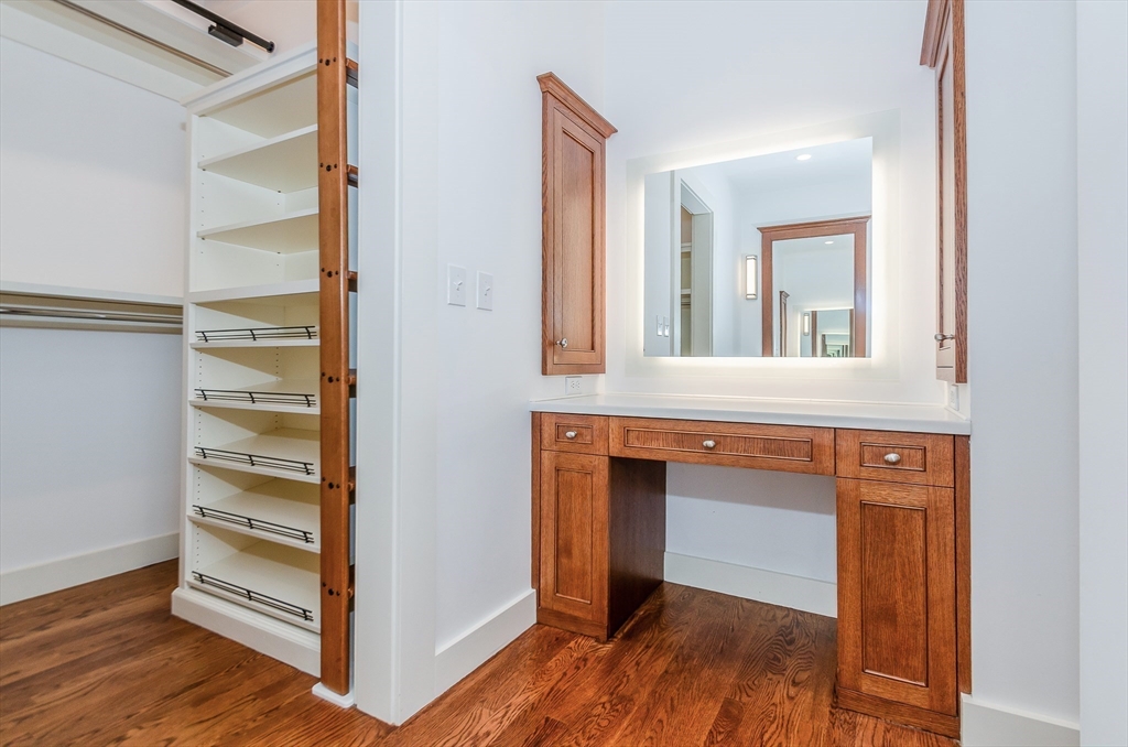 345 Point Road Marion, MA 02738 - Photo 23 of 41 a view of an entryway with wooden floor and cabinet