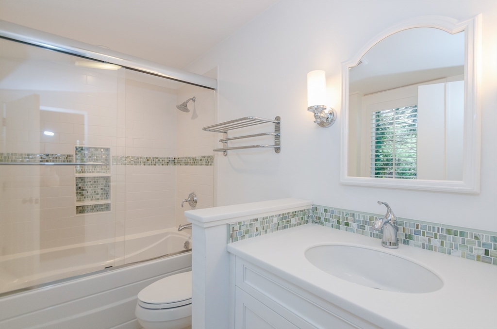 345 Point Road Marion, MA 02738 - Photo 26 of 41 a bathroom with a granite countertop sink toilet and shower