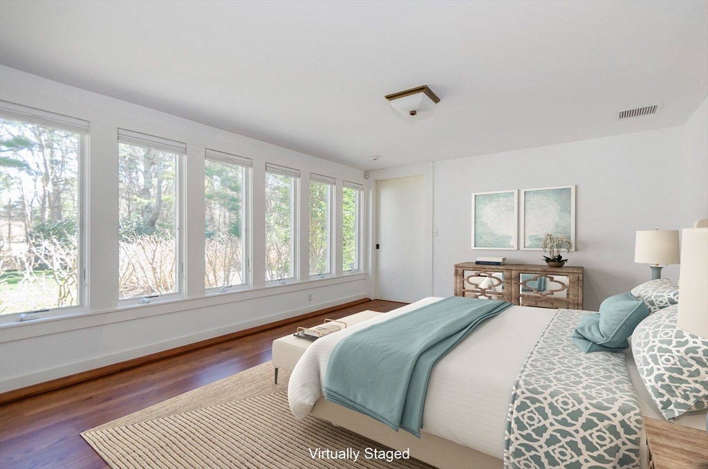 345 Point Road Marion, MA 02738 - Photo 30 of 41 a bedroom with a large bed and a window