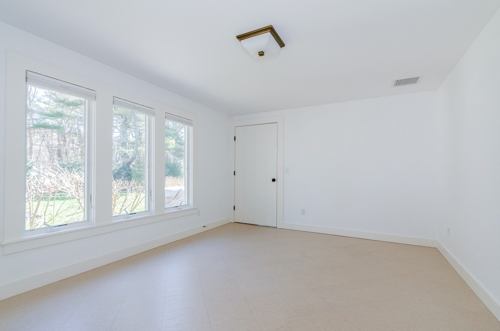 345 Point Road Marion, MA 02738 - Photo 33 of 41 a view of an empty room with a window