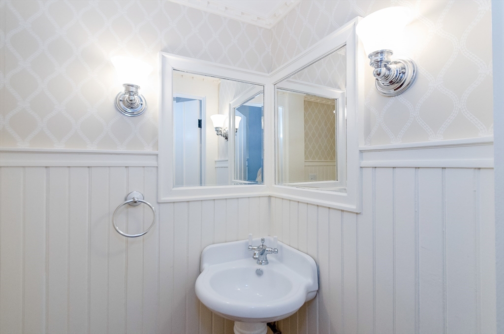 345 Point Road Marion, MA 02738 - Photo 36 of 41 a bathroom with a sink vanity and mirror