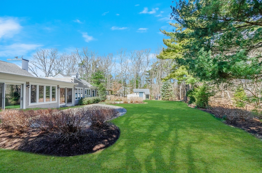 345 Point Road Marion, MA 02738 - Photo 39 of 41 a view of a house with backyard and garden